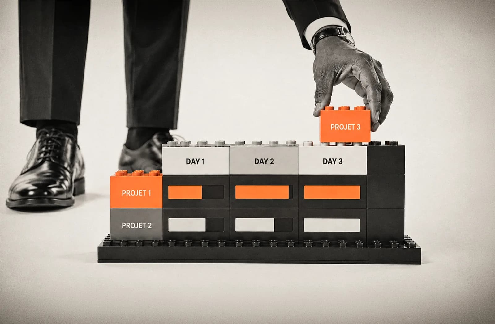 A schedule built out of bricks, project by project and day by day